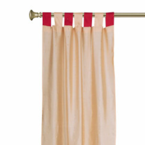 Gold sari tab top curtains hung at a window