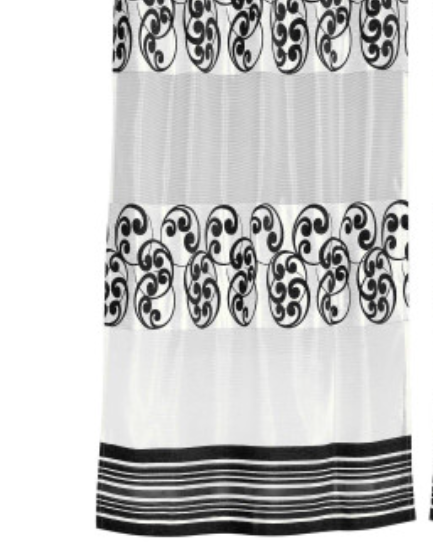 Black sheer tissue ring top curtains hung at a window