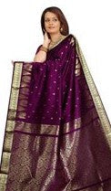 Magenta art silk sari shown draped on a model