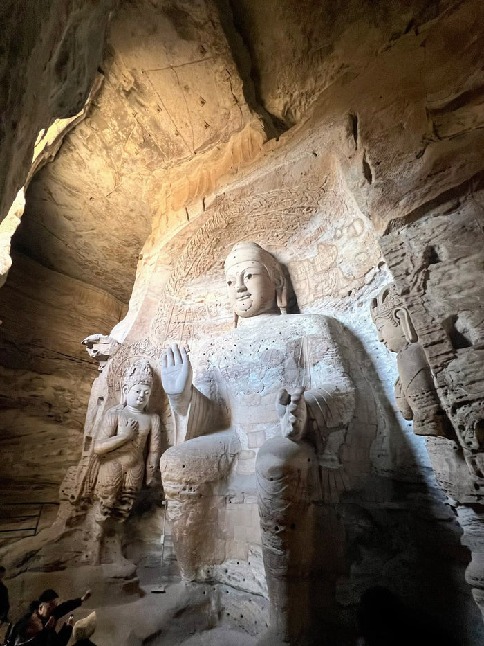 Large Buddha carving inside Yungang Grottoes