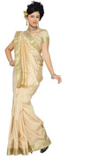 Golden art silk sari shown draped on a model