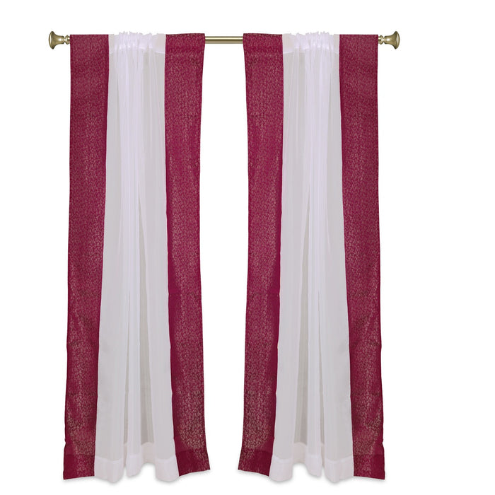 Maroon sheer tissue rod pocket curtains hung at a window