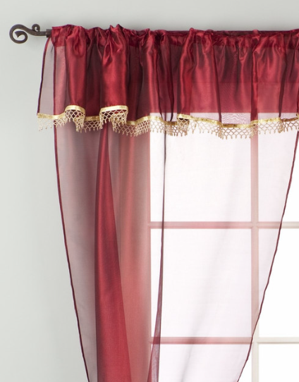 Maroon sheer tissue rod pocket curtains hung at a window