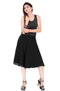 Black georgette pleated skirt shown draped on a model
