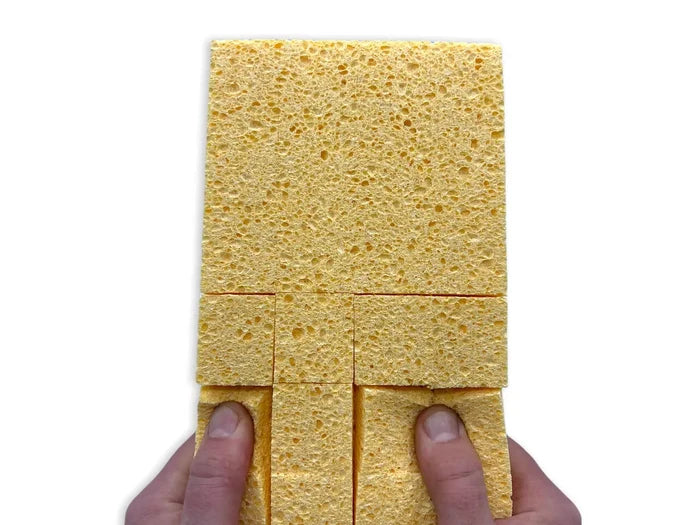 SPUGNA CON MANICO (CON TAGLI)