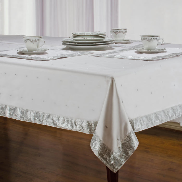 Silver sari tablecloth laid on a dining table